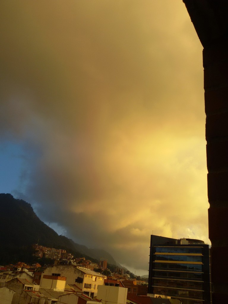 Puffy, cascading clouds at twilight in Bogotá